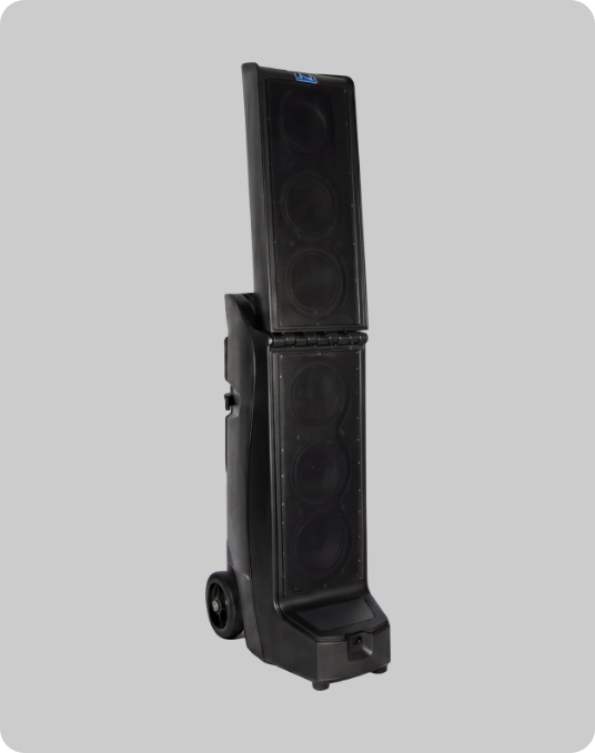 Anchor Audio Bigfoot 3 portable PA system standing upright on wheels, shown in profile view with the satellite speaker tower extended above the subwoofer base unit Anchor Audio Bigfoot 3 portable PA system standing upright on wheels, shown in profile view with the satellite speaker tower extended above the subwoofer base unit